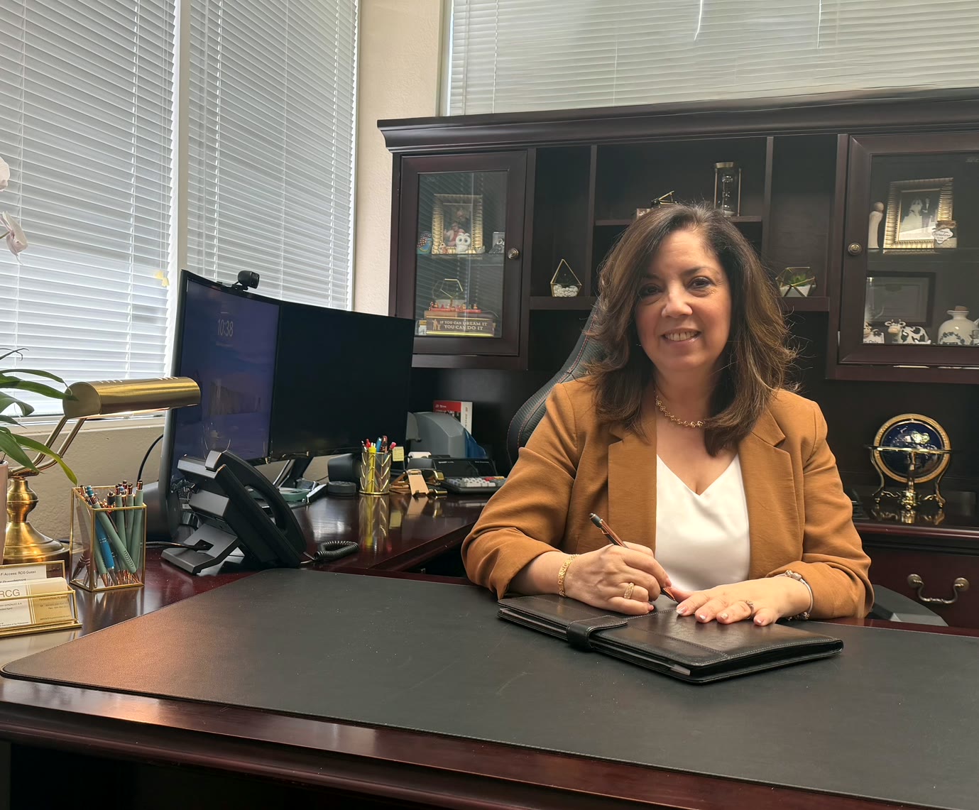 Deborah Gonzalez, IRS Enrolled Agent, at her desk in the RCG Accounting & Associates office in Pembroke Pines